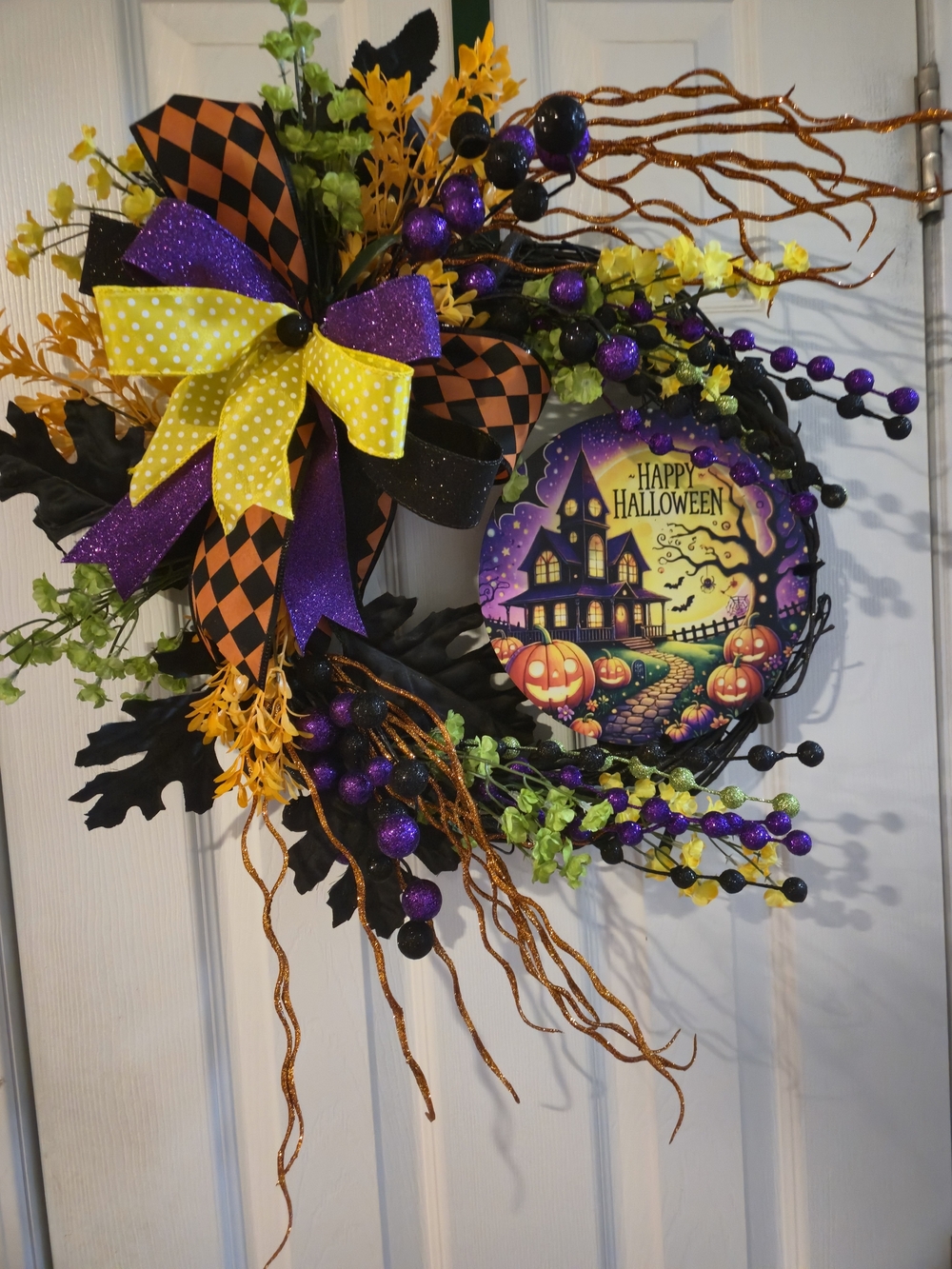 Festive Halloween Door Wreath with Purple, Orange & Yellow Accents